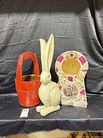 Group shot showing rabbit statue, red wood bucket, mosaic clock cabinet