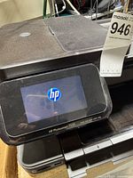 Front view of HP Photosmart 7520 showing touchscreen with HP logo