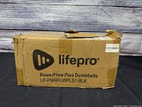 Original LifePro PowerFlow Plus Dumbbells box front showing model number