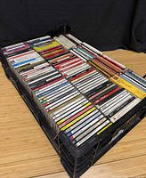 Crate filled with over 100 classical music CDs