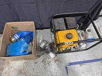 Pump, hoses in box, bagged fittings