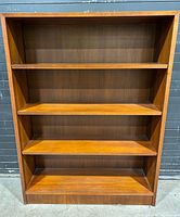 Front view showing four shelves and overall condition