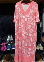 Full lot showing nightgown, navy Skechers shoes, silvertone flats, pink gloves