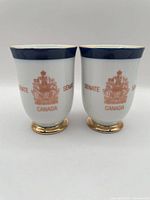 Front view showing Senate crest and cobalt band on both goblets