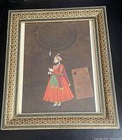 Full view of framed miniature painting showing figure, stamp and frame detail