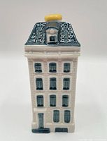Front view of Delft Blue miniature house showing facade details