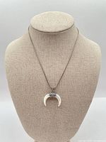 Full view of necklace on display bust