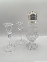 Shaker and two candlesticks group shot