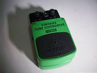 Top view of Behringer TO800 pedal showing branding and footswitch pad