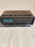 Front view showing Panasonic digital display at 12:00