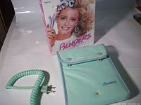 Retail box, heating pouch, and coiled power cord overview