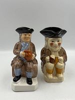 Front view of both Toby jugs