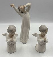 Front view of all three Lladro figurines