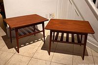 pair of teak side tables angled view