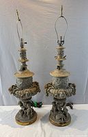 Both lamps full view showing matching design, wiring, harps, finials