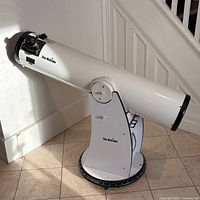 Full view of Sky-Watcher Dobsonian telescope on its base