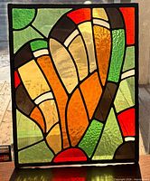 Full view of stained glass panel showing colours and design