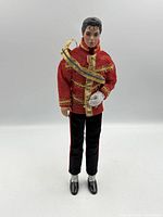 Front full-length view of Michael Jackson doll showing outfit and accessories