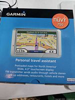 Box front showing model, screen illustration and features