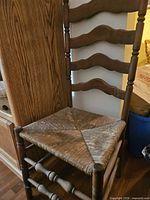 Full view of ladderback chair front and side