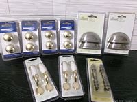 Group shot of all nine unopened hardware packages