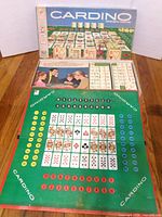 Box and opened board with playing pieces visible