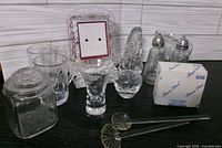 entire group showing canister, tumblers, cordial glass, bud vase, picture frame, angel, shakers, box, ladle stirrers