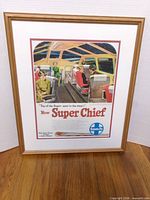 Front view of framed and matted advertising print