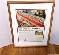 Front view of framed advertising print