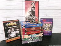 Group shot showing all VHS and DVD cases