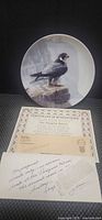 Front view of plate with COA papers
