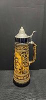 Front view of Gerz stoneware beer stein with pewter lid