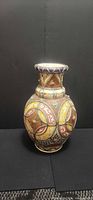 Front view of the multicolor glazed earthenware vase