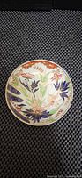 Top view of polychrome floral porcelain bowl