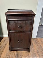 Full view of wooden gramophone cabinet