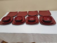 Full set laid out showing plates and bowls