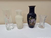 Group shot of all four vases on table