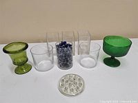 Group shot of all glass items arranged on table