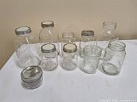 All jars front view showing variety and lids