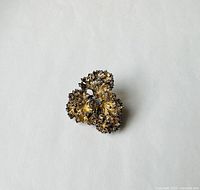 Front view showing parsley leaf design and gold wash