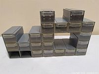 Front view showing full cabinet with twenty drawers