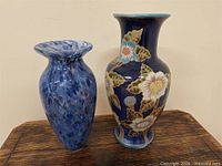 Both vases side by side for scale and style comparison