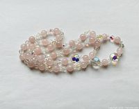 Necklace coiled to show bead types and colors