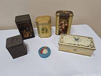 Group shot of all six tins showing size and decoration