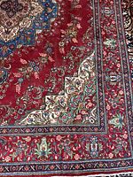 Close-up of border and corner spandrel showing floral design and double pile texture