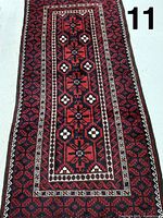 Full view of rug showing entire pattern and border