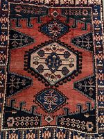 Full view of Persian Viss rug showing overall pattern and colors