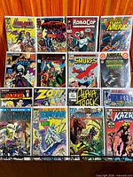Overall view of 15 first-issue comics arranged in four rows
