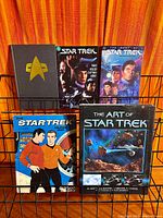 All five Star Trek books displayed on rack