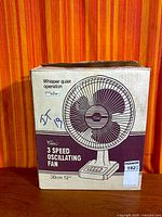 Front of retail box showing fan illustration and specs